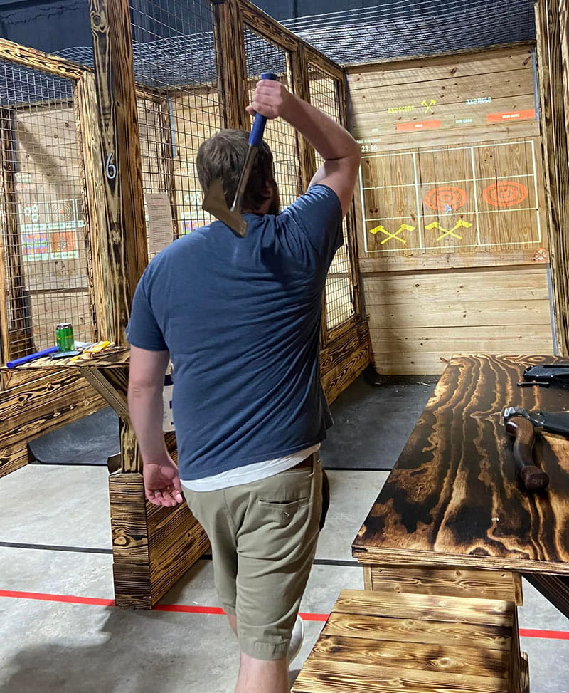 axe throwing on projected targets in Cypress, TX